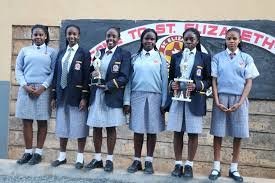 St. Elizabeth Girls students with academic and co-curricular trophies